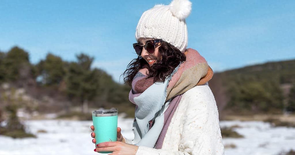 Coffee mug with sliding lid